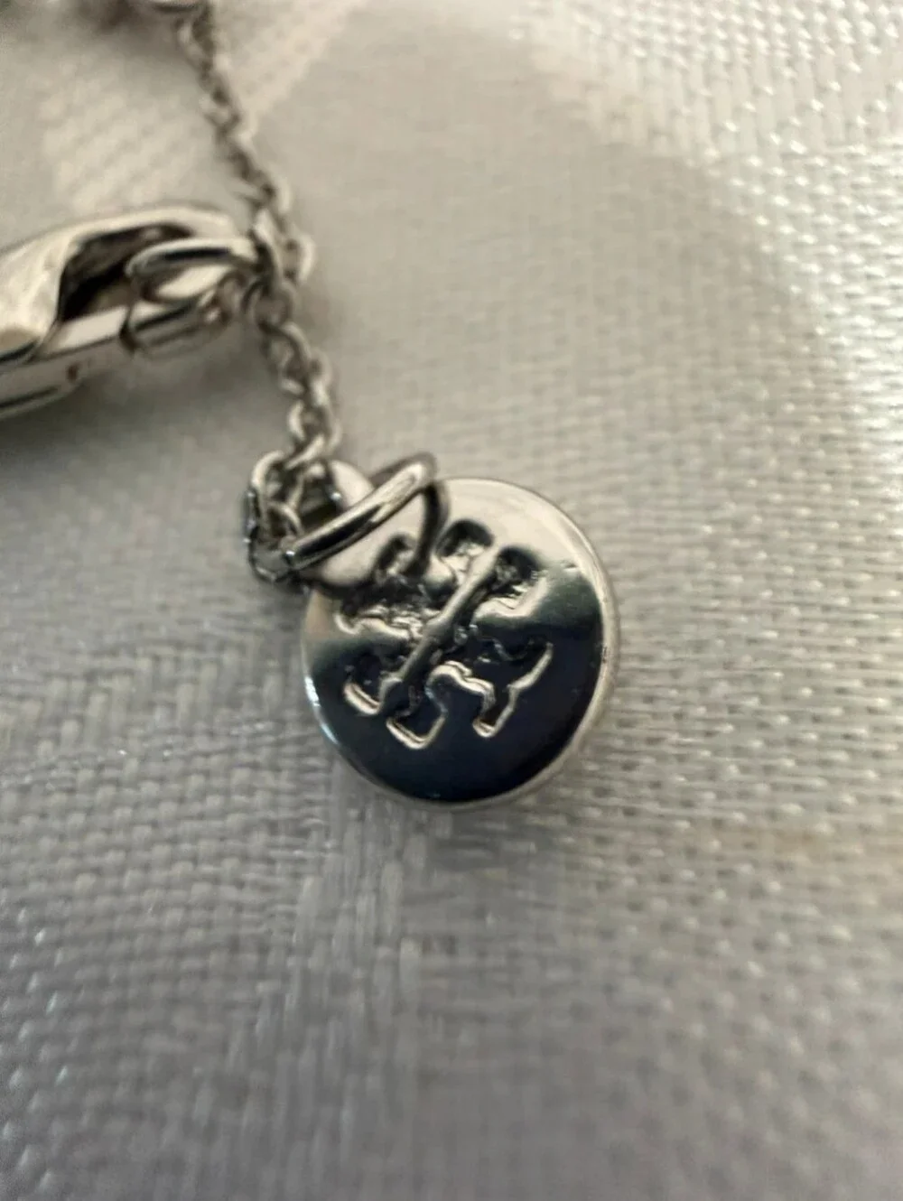 Tory Burch Silver-Tone Gray Pearl & Crystal Logo Bracelet